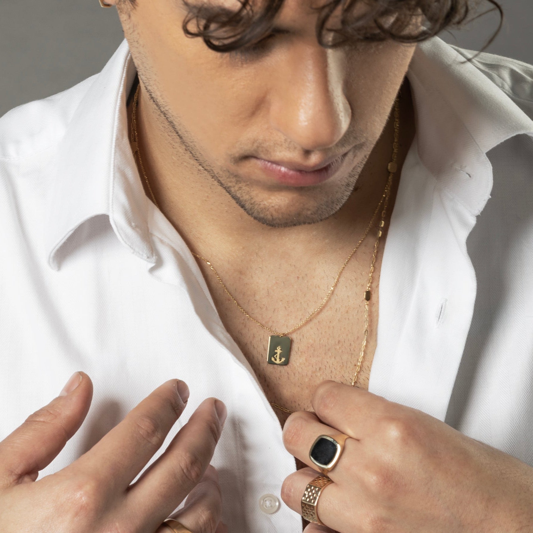 Collana da Uomo Collezione Nautilus con Ancora satinata su piastra rettangolare