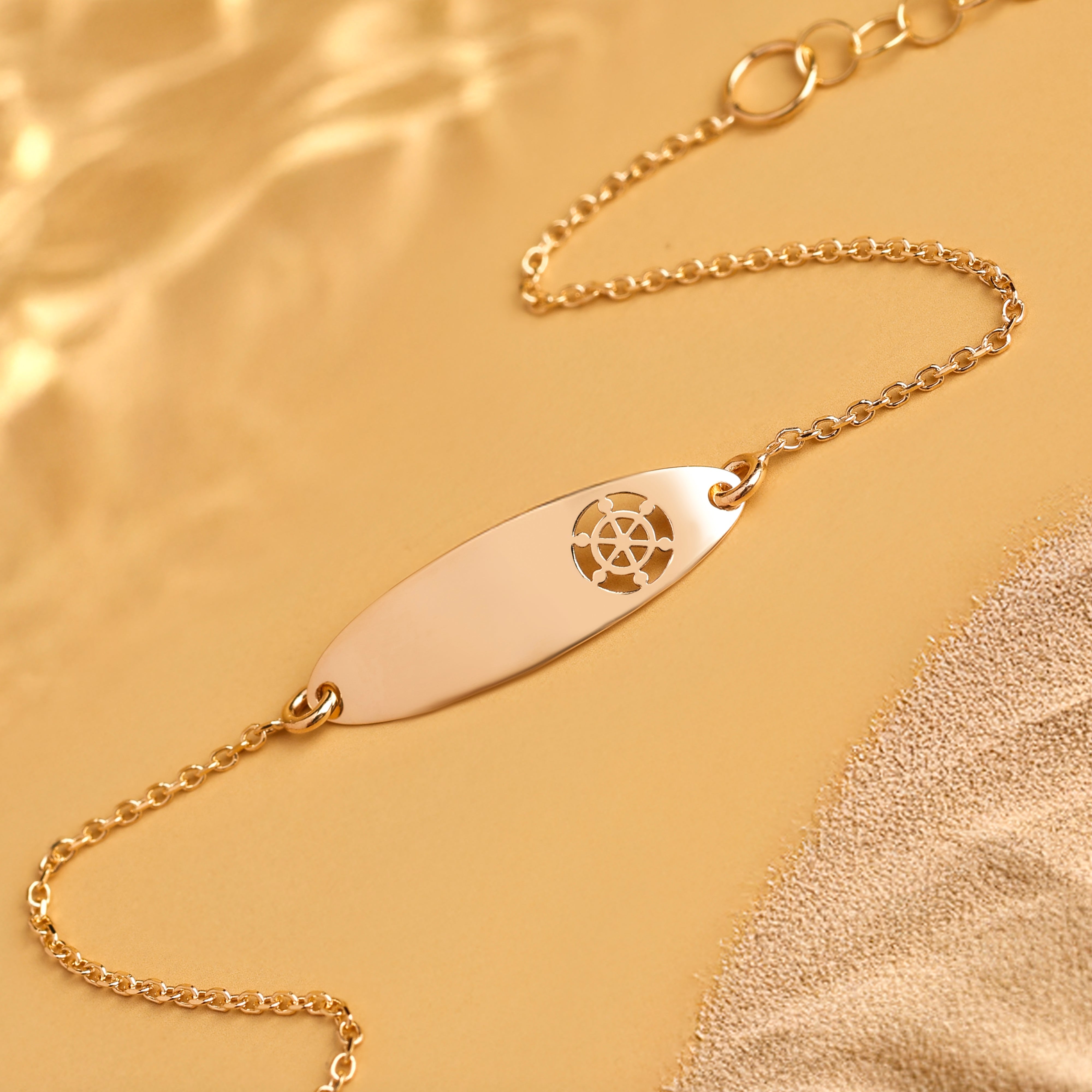 Bracciale Baby con targa ovale e timone traforato