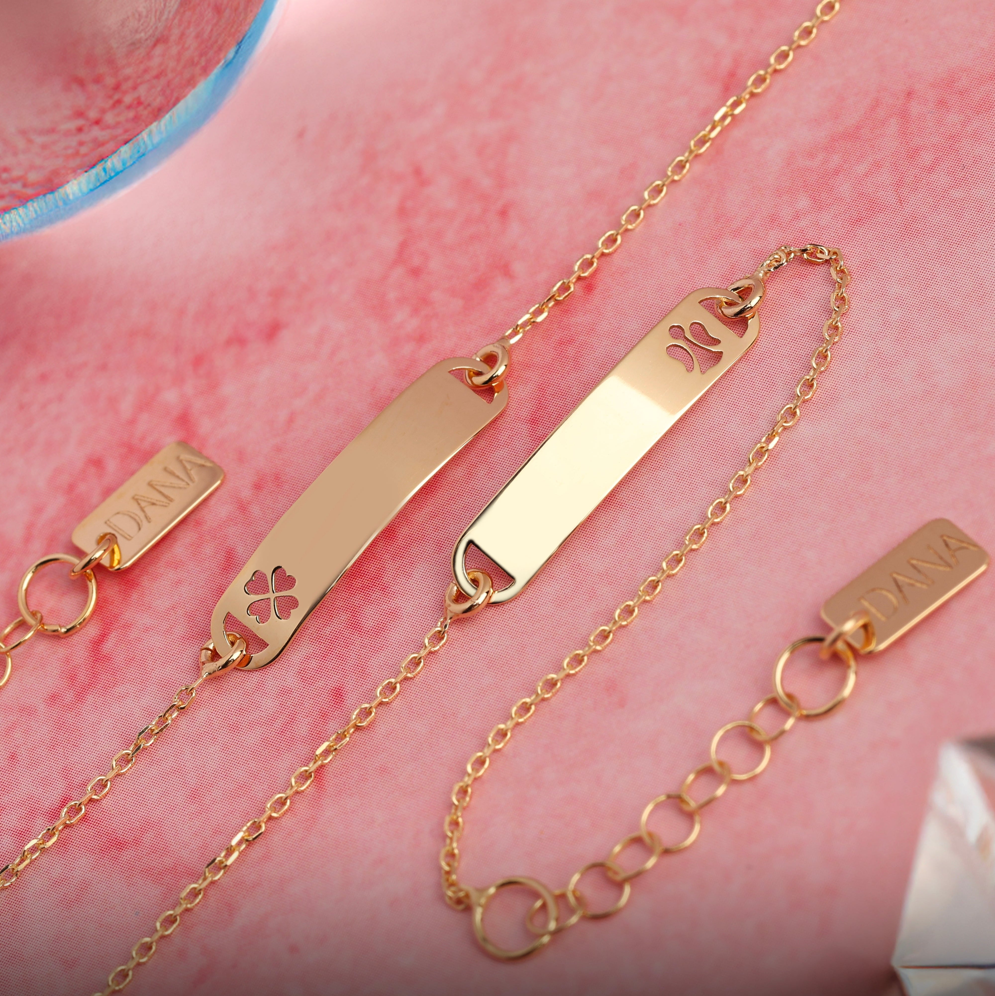 Bracciale Baby con targa rettangolare e quadrifoglio traforato