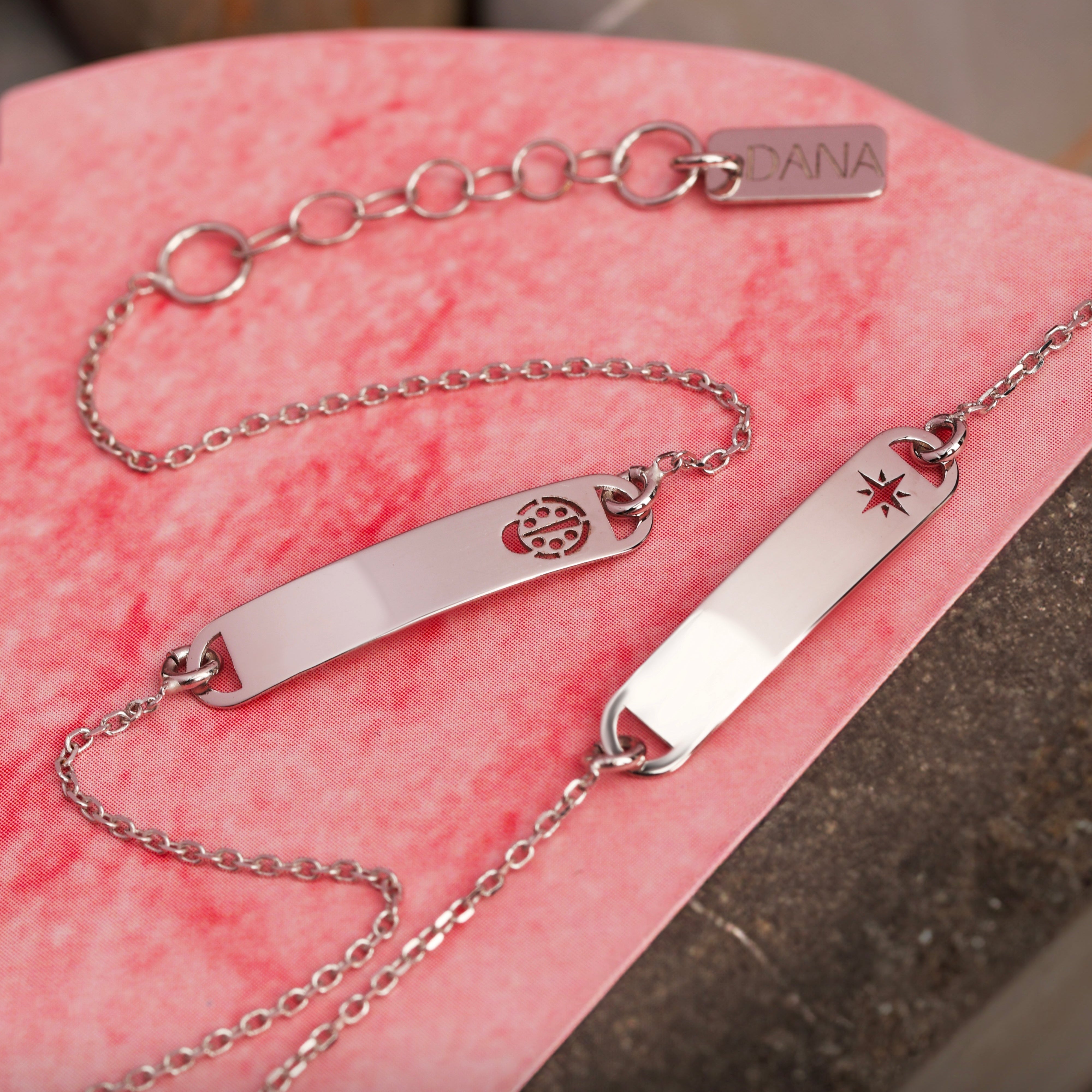 Bracciale Baby con targa rettangolare e rosa dei venti