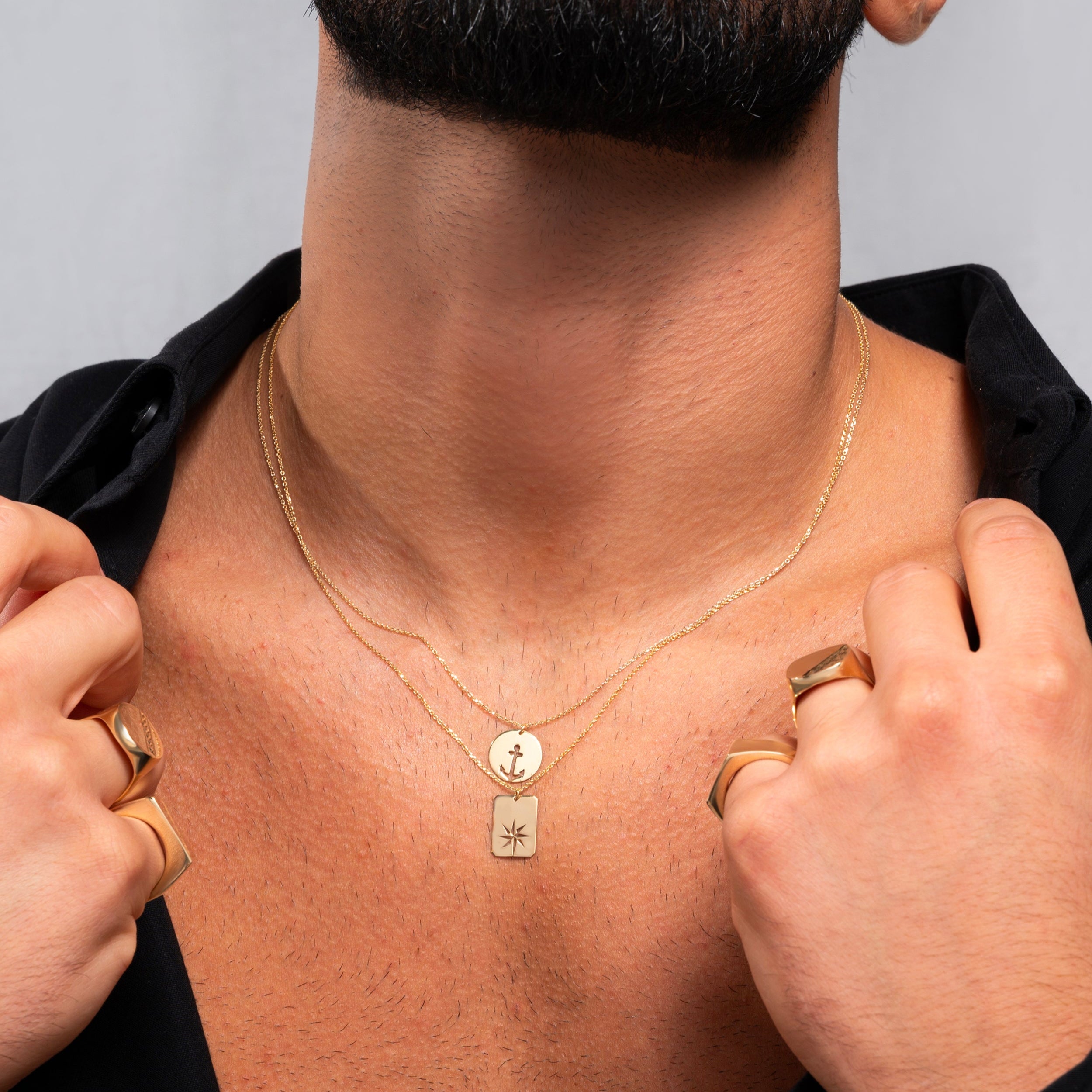 Collana da Uomo Collezione Nautilus con Ancora traforata su piastra tonda